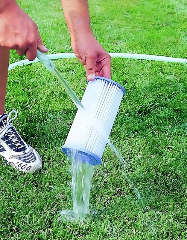 Person rinsing Bestway 58012 Type IIIA pool filter cartridge with water hose on grass